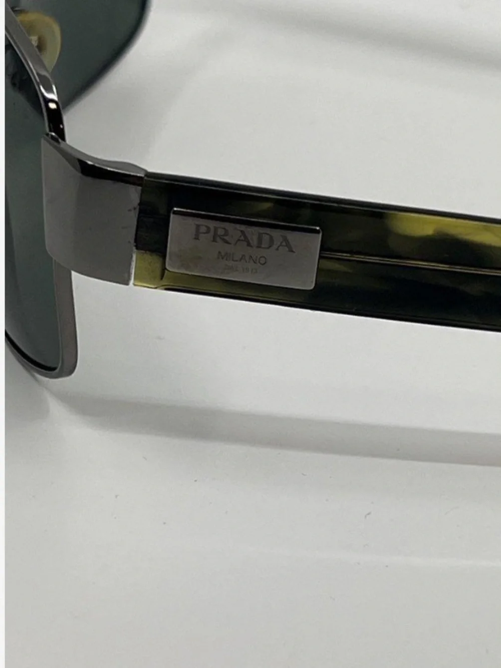 Prada Men’s Sunglasses Silver Frame with Dark Green Lenses